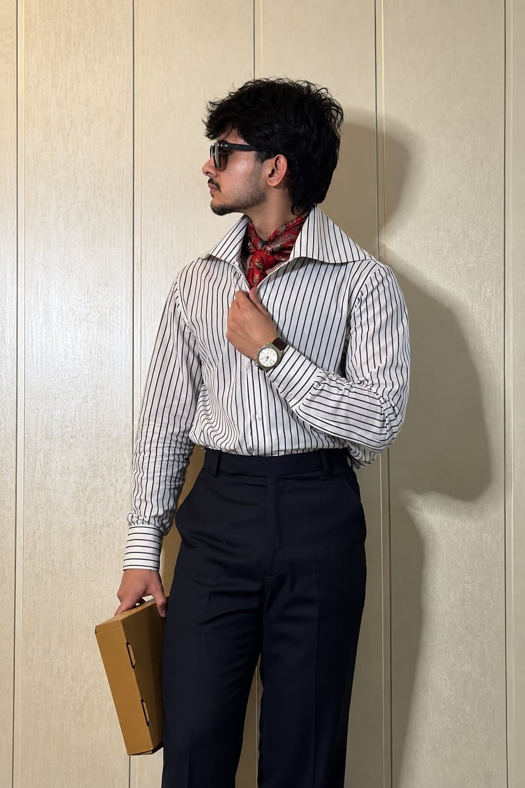 Worn open, sleeves down.